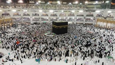 From above of crowded square around Kaaba cube in Great Mosque of Mecca at night time