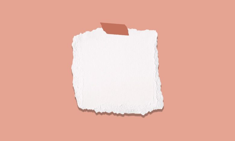 white and blue paper on pink surface